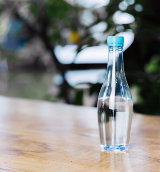 plastic-bottle-water-wooden-table