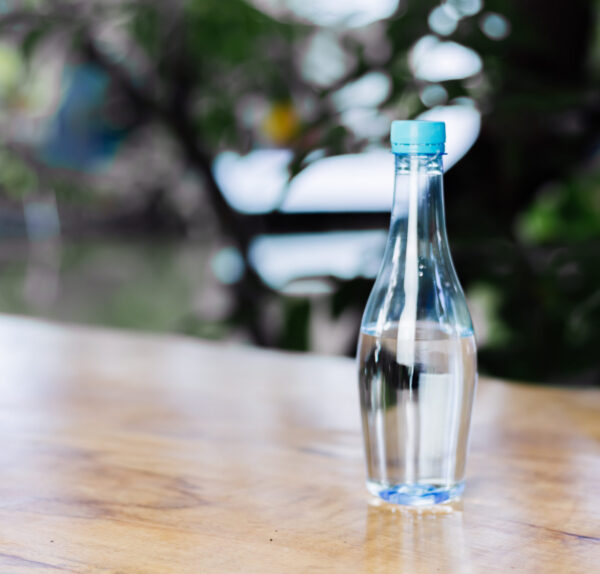 plastic-bottle-water-wooden-table