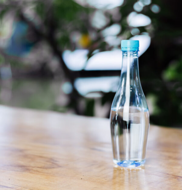 plastic-bottle-water-wooden-table